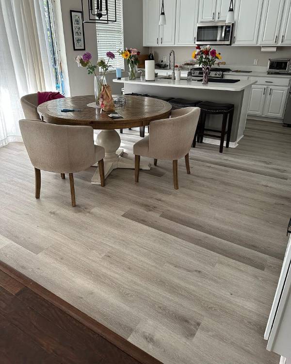 Luxury vinyl plank flooring with realistic wood grain texture