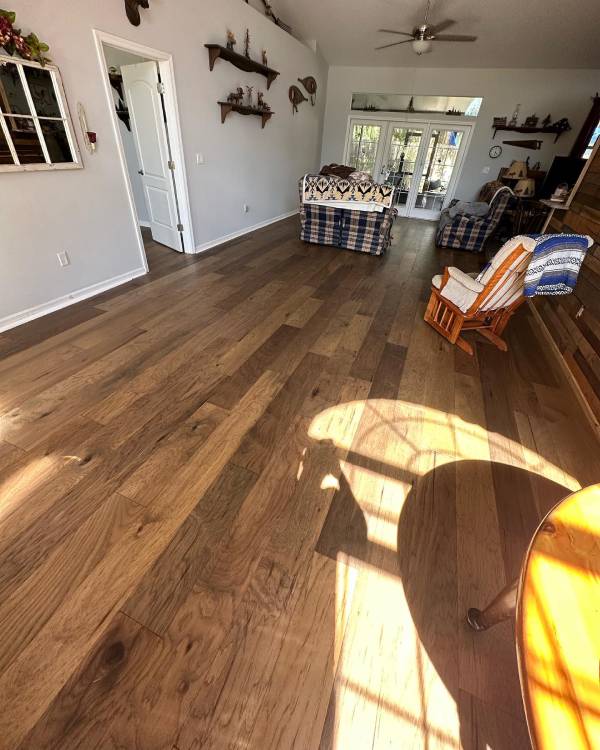 Finished hardwood flooring showing natural grain and warm tones