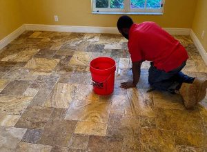 Red Eagle Flooring technician installing tile floor — flooring installation services for residential interiors