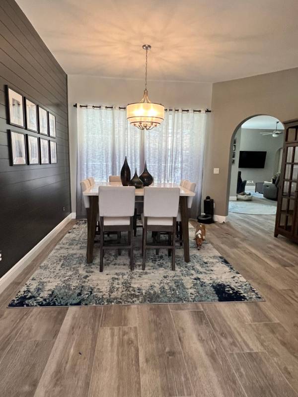 Freshly installed floor tile with clean, even grout lines by Red Eagle Flooring
