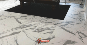 "Red Eagle Flooring showcase with white and grey marble-look tiles, exemplifying how LVT (Luxury Vinyl Tile) can mimic natural stone in the LVP vs. LVT comparison