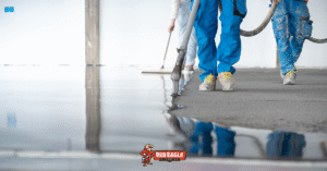A glossy dark gray floor showcasing a finished garage floor epoxy installation.